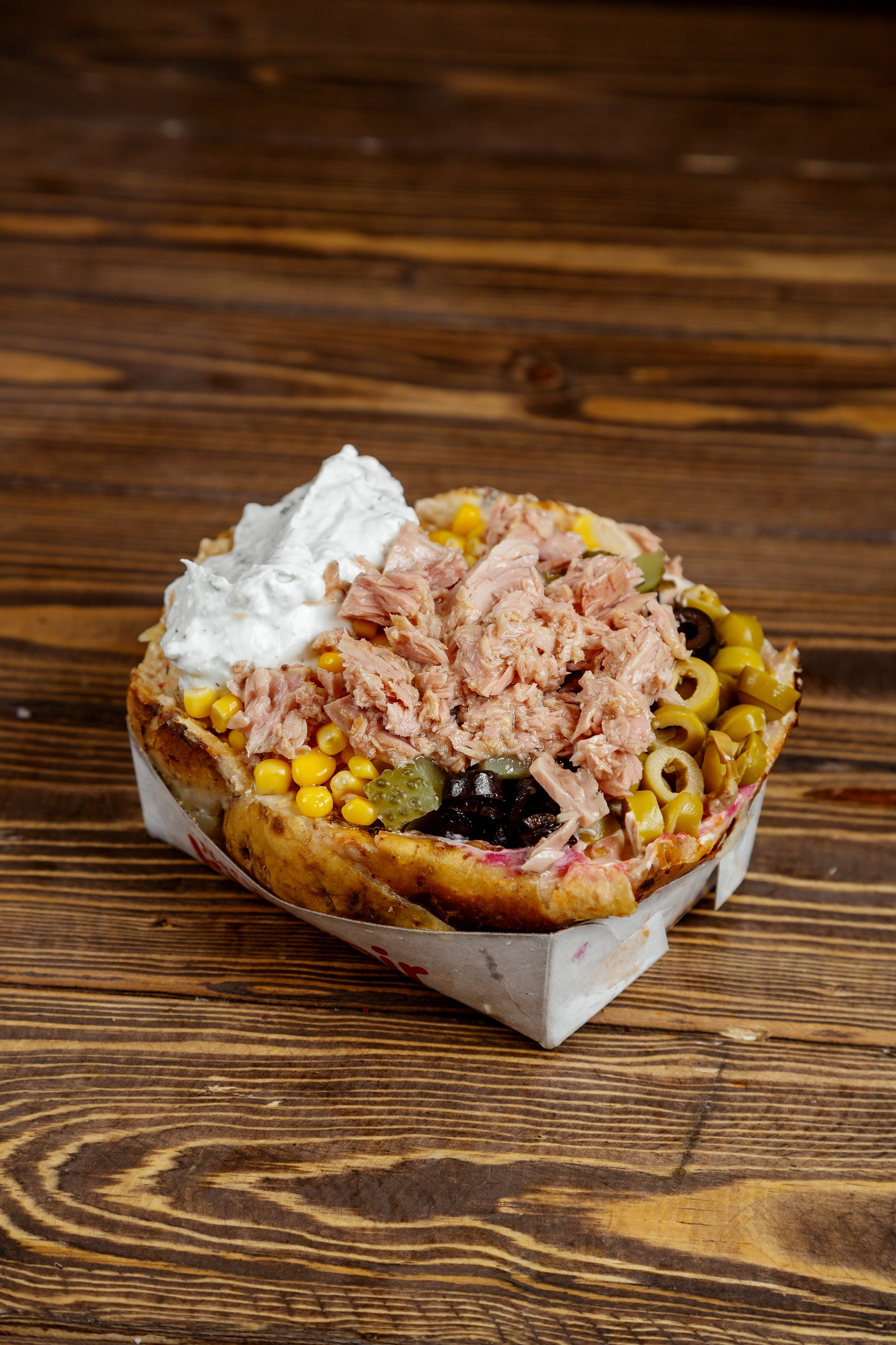 Classic Turkish kumpir loaded with colorful toppings